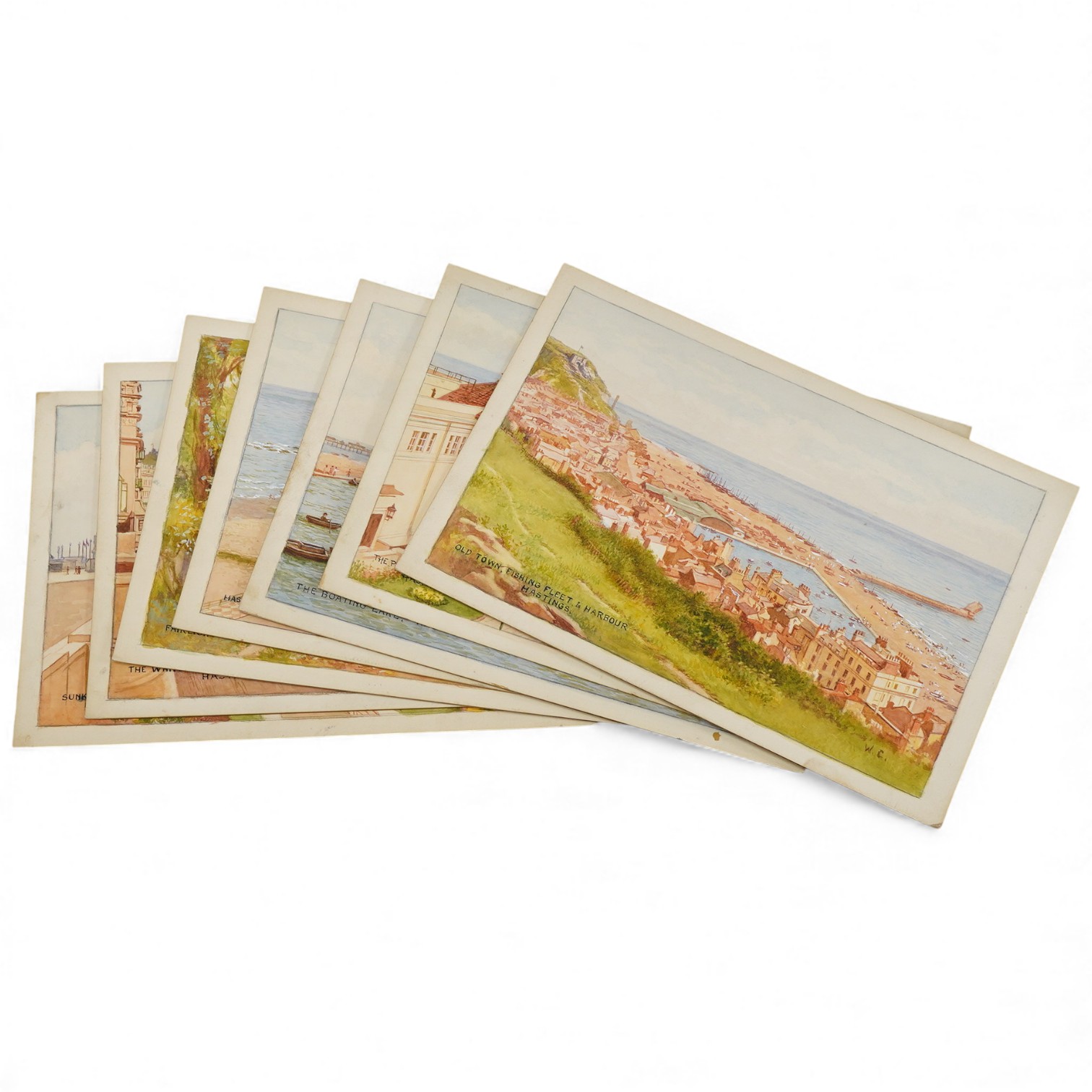 William Carruthers Affleck (1868-1943), Set of seven original watercolours for postcard designs, comprising of Hasting views, to include: ‘Sunken Gardens’, ‘Fairlight Glen’ and ‘The Pier’, 21 x 31cm